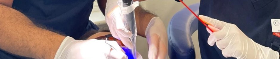 Nurse Tabitha receiving dental treatment at Christchurch Dental as part of her Invisalign journey